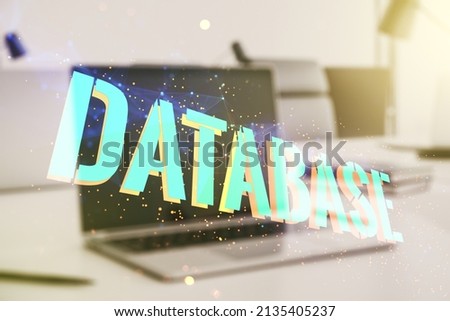 Double exposure of Database word sign on laptop background, global research and analytics concept