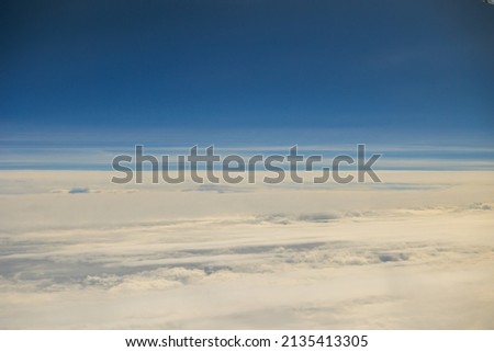 The world above the clouds seen from an airplane