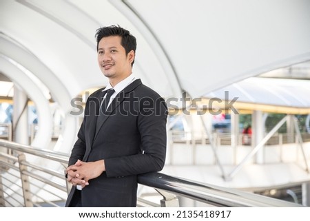 Business asian man in work style