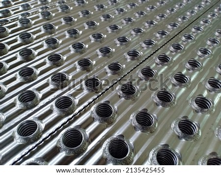 Aluminium with a round pattern perfect for background Royalty-Free Stock Photo #2135425455
