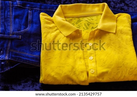 Yellow blue trend in clothes. Spring - summer collection Fashionable color of peace, close up details