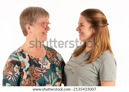 A mother and daughter who are very happy with each other.