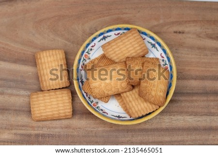 New glucose biscuit  isolated and square cookies, tasty fresh food glucose biscuit  in the white background.
