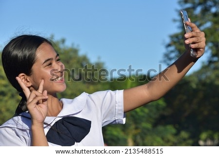 An Asian Female Teen Selfie