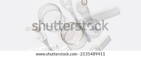 Banner Natural medicine, cosmetic research, bio science, organic skin care products. Top view, flat lay. Skincare. Scientific laboratory glassware. Research and development Concept Royalty-Free Stock Photo #2135489411