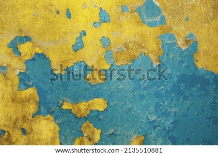Yellow-blue color on the old wall. Flag of Ukraine. Background.