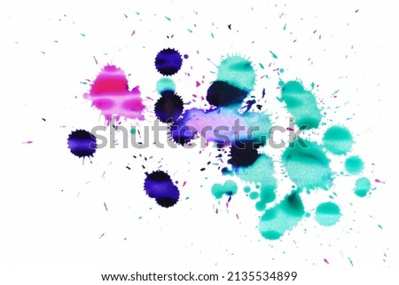 Colorful ink splashes and drops isolated on white with clipping path, top view