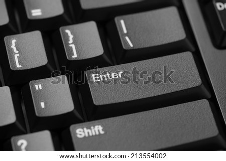 Black computer keyboard closeup.