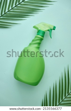 A studio photo of a household spray bottle
