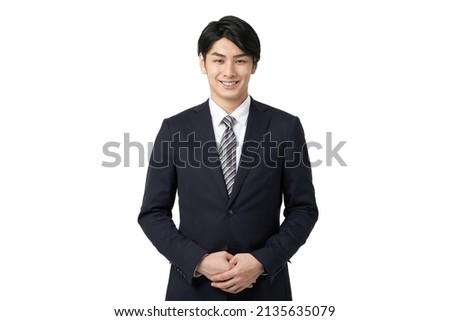 Asian businessman greeting with a smile Royalty-Free Stock Photo #2135635079