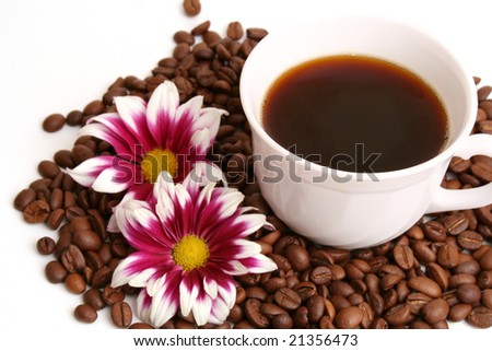 Cup of coffee and coffee grains