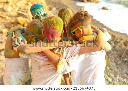 Children play by the sea. A group of children have fun in nature. High quality photo