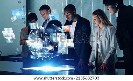 Group of people watching hologram screens. Digital contents.
