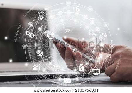 Businesswoman using a tablet computer to virtual screen dashboard with project management
