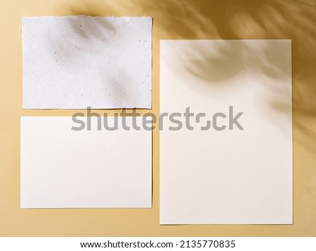 Minimalist simple design mood board, template with leaves soft shadow. Neutral earth tones. Handmade torn paper on beige background. To do list, invitation, poster, mockup or letter concept.