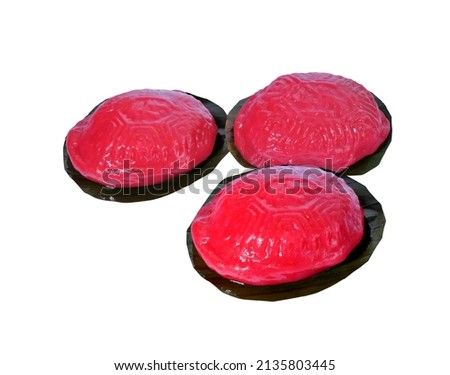 Close up of Chinese red tortoise cakes (Ang Ku Kueh) isolated on white background, selective focus. Clipping path included.  Royalty-Free Stock Photo #2135803445