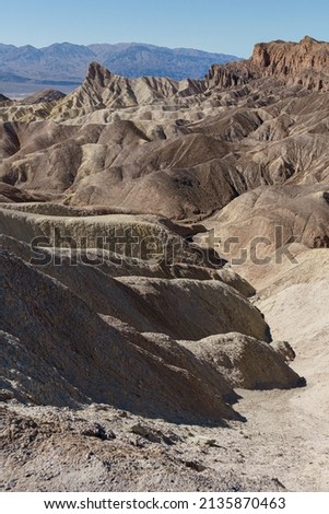 Death Valley national park USA, sunny day rock and mountain formation. Amazing colours due to minerals in the rocks.