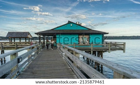 Tourists on the Pier in Campbell River, Vancouver Island, British Columbia, Canada Royalty-Free Stock Photo #2135879461