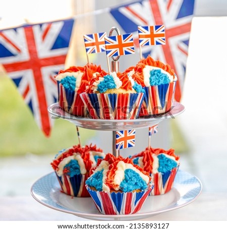 Platinum Jubilee Cupcakes in the Design of the Union Jack. Designed for the upcoming street parties in the summer to celebrate the Queen's Jubilee.  Royalty-Free Stock Photo #2135893127