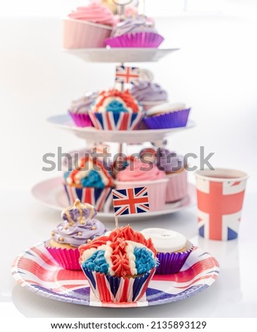 Platinum Jubilee Cupcakes in the Design of the Union Jack. Designed for the upcoming street parties in the summer to celebrate the Queen's Jubilee.  Royalty-Free Stock Photo #2135893129