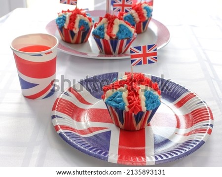 Platinum Jubilee Cupcakes in the Design of the Union Jack. Designed for the upcoming street parties in the summer to celebrate the Queen's Jubilee.  Royalty-Free Stock Photo #2135893131