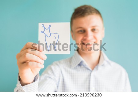 Picture icon tooth in his hand
