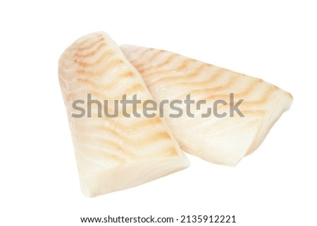Cod fish loins two fresh uncooked pieces isolated on white background. Royalty-Free Stock Photo #2135912221