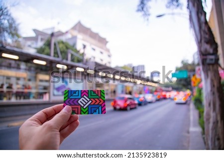 hand holding the multipurpose card for the various public transportation in Mexico City