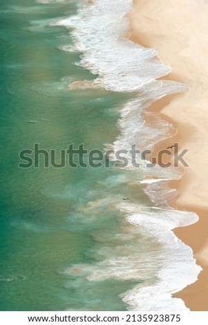 Abstract photograph of waves movement on the beach