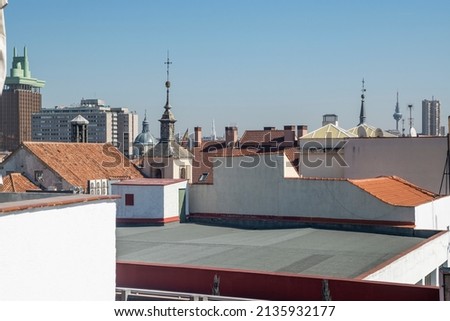 roofs of buildings and churches in the center of Madrid