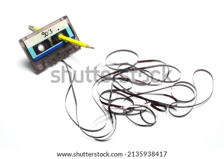 A pen for rewind cassette tape compact retro on white background. 90's concepts. Royalty-Free Stock Photo #2135938417