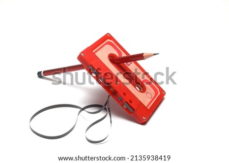 A pen for rewind cassette tape compact retro on white background. 90's concepts. Royalty-Free Stock Photo #2135938419