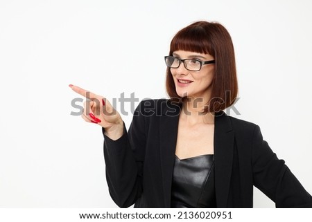 attractive woman posing with glasses a leather suit black jacket Lifestyle unaltered