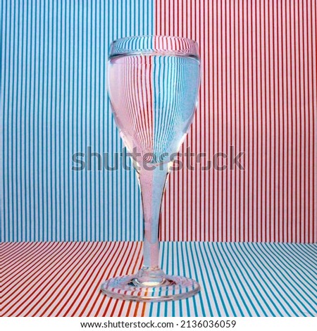 Square format of water reversal technique with candy stripe background