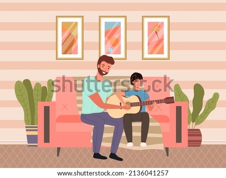 Father with child holding musical instrument. Dad teaches his little son to play guitar. Parent and kid happy together at home. Musician teaches child to make music. Family spends time with music
