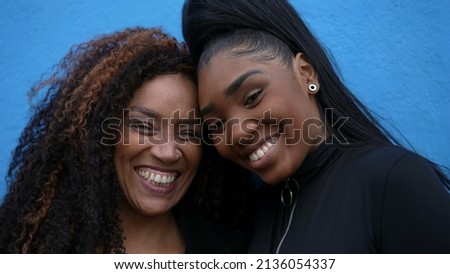 Daughter hugging mother a Brazilian family love