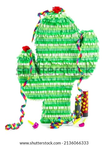 Mexican pinata in shape of cactus with ribbons on white background
