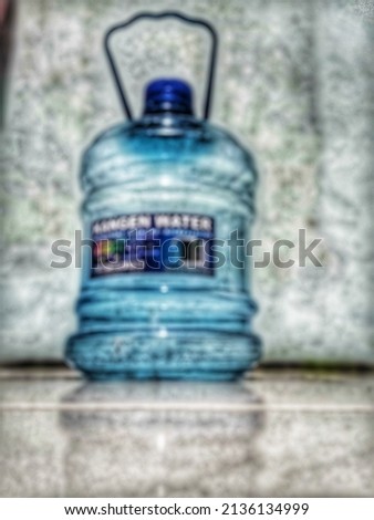 Defocused abstract background shortcut of The mini water gallon is practical to carry anywhere