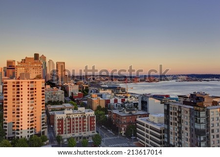 Scenic view of mountain Rainer during sunset. Downtown and port of Seattle, WA state