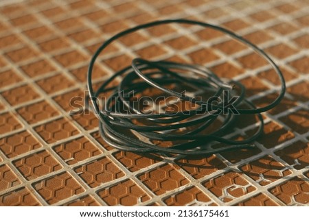 the remaining cable for the black electrical installation that is not used