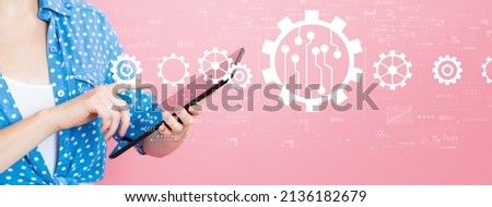 Automation concept with young woman using a tablet computer