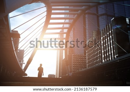 BTS-BRT Sky Bridge at Sathon-Narmdhiwas Intersection. This area is a center of financial in Thailand Royalty-Free Stock Photo #2136187579
