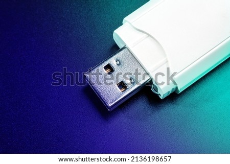usb flash drive on black background with cyberpunk light, Data collection technology Royalty-Free Stock Photo #2136198657