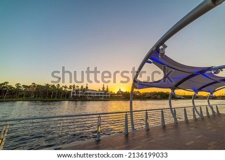 Tampa Riverwalk under a clear sky at sunset. Florida, USA