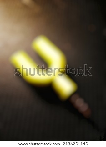 Blurry picture of yellow audio splitter