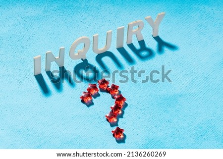 the word request is written on a blue canvas in wooden letters, next to it is a question mark made of red acrylic stars
