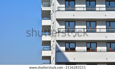 Modern elements in  contemporary  architecture.. Architectural details of a modern apartment building. Royalty-Free Stock Photo #2136283211