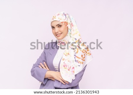 Portrait of hijab girl smiling. Pretty muslim girl. Beautiful asian muslim woman model in formal office attire posing over white background studio Royalty-Free Stock Photo #2136301943