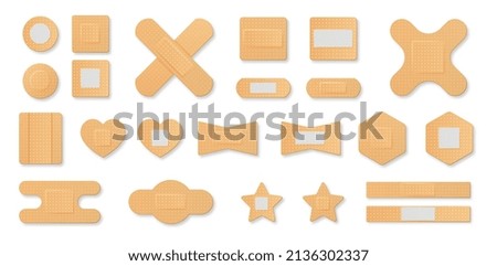 Set of First aid band plaster. Medical patches of various shapes for sealing wounds and skin injuries. Design elements for web. Cartoon realistic vector collection isolated on white background Royalty-Free Stock Photo #2136302337