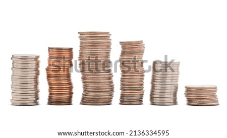 Money, Coins. Columns of coins. Savings concept. Falling currency. Coin Dollar, 1 penny, 5 Nickel, 10 Dime, 25 Quarter. Macro High resolution photo Full depth of field. Isolated white background